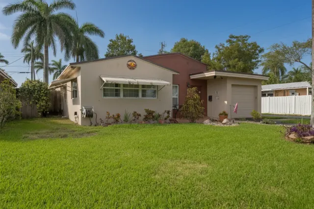 The same property under a clear blue sky