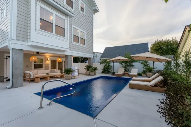 The same swimming pool, furnished in a Modern Organic style